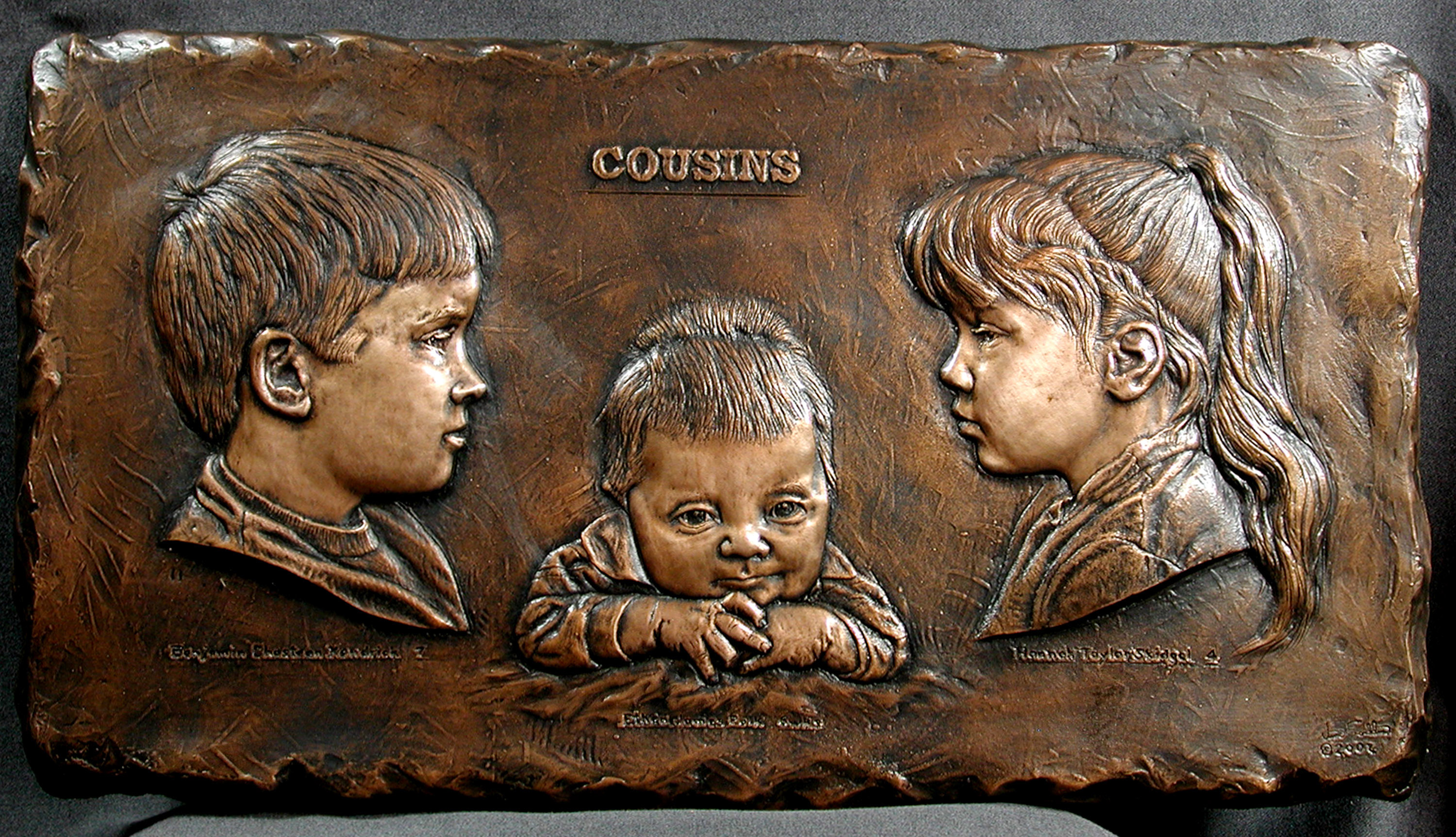 "Cousins" relief portrait of artists grandchildren